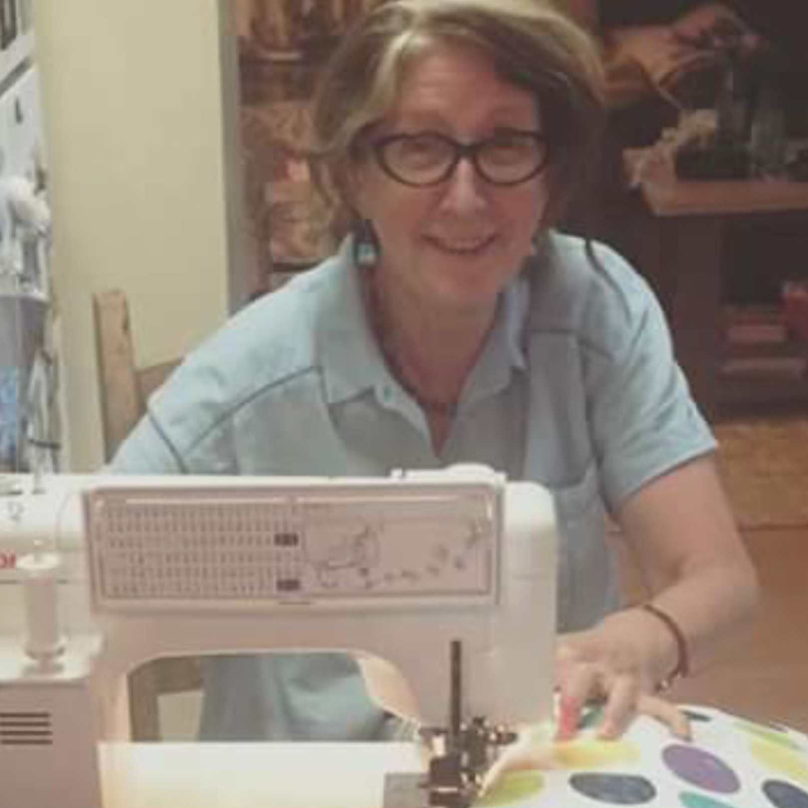 Pauline Short at sewing machine